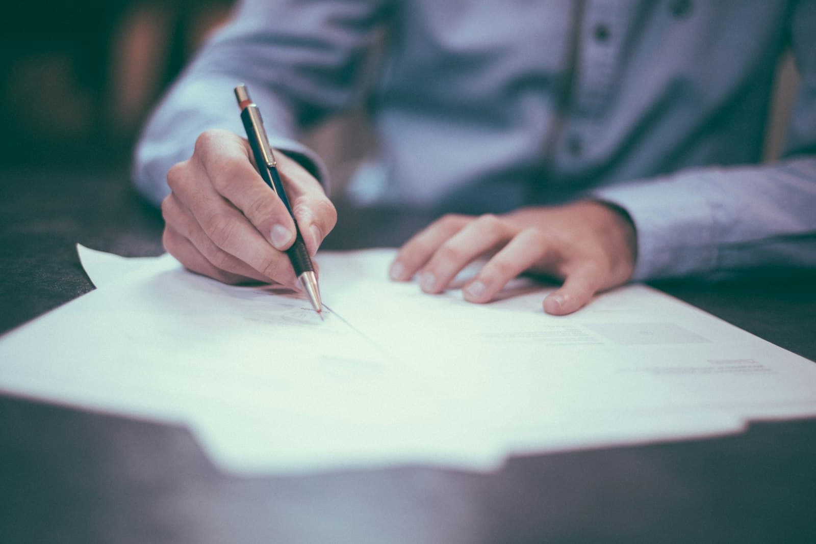 Lawyer working on documents at an office desk